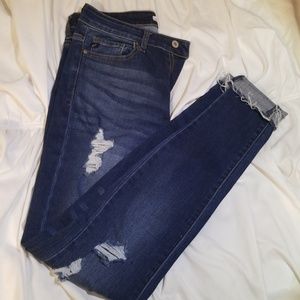 New, Dark, Skinny Denim Jeans with a couple holes